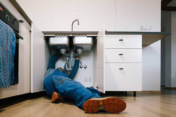 Professional Emergency Plumber technician working in Blandford, MA